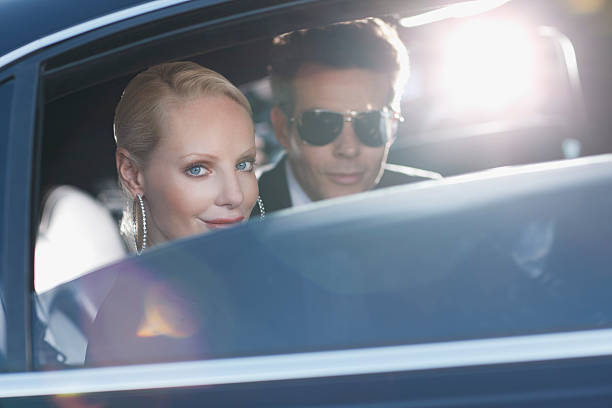 Chauffeur Driven Car Hire London Elite Executive Chauffeur Waiting By Luxury Saloon