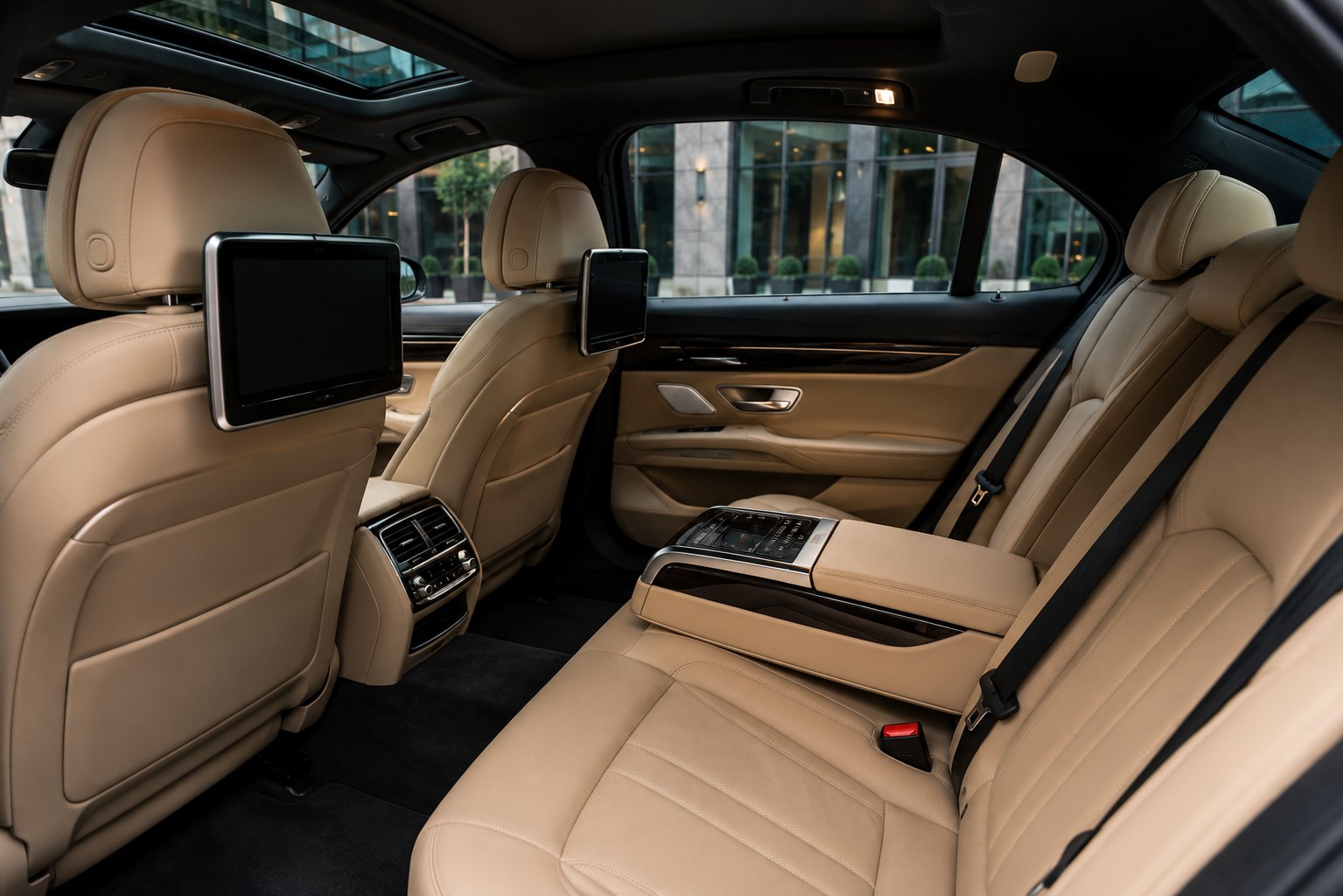 Chauffeur Booking For Business Fleet Vehicle Rear Interior Space Showcasing Hand Tailored Luxury Leathers And Premium Multimedia Integration